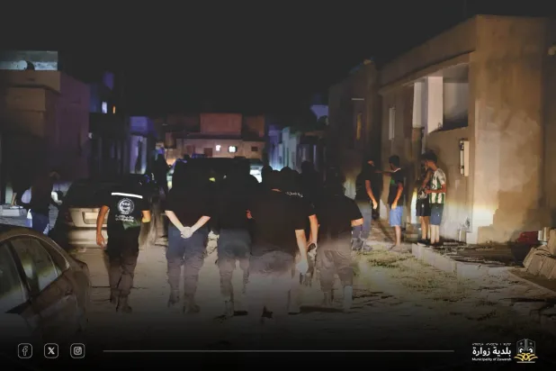 جانب من مهاجرين غير نظاميين تم ضبطهم في مدينة زوارة غرب ليبيا 4 يوليو (مديرية أمن زوارة)