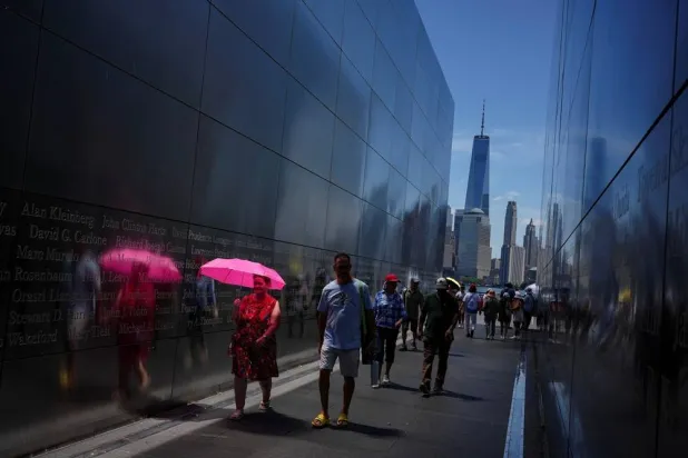  People walk through the Empty Sky Memorial, with the One World Trade Center in the background, as the United States celebrates its 250th anniversary on Independence Day, in Jersey City, New Jersey, US, July 4, 2026. (Reuters)
