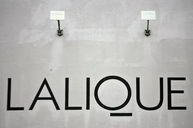  This photograph shows the logo of French luxury crystal manufacturer Lalique displayed on the facade of the group's factory in Wingen-sur-Moder, eastern France on December 5, 2007. (AFP)