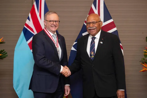Australian Prime Minister Anthony Albanese (L) shakes hands with Fiji's Prime Minister Sitiveni Rabuka (R) before a bilateral meeting at the Grand Pacific Hotel in Suva on July 6, 2026. (Photo by Leon LORD / AFP)