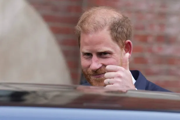 FILE PHOTO: Britain's Prince Harry departs after attending court for his appeal against the rejection of his legal challenge to the British government's decision to take away his police protection when he is in Britain, outside the High Court in London, Britain, April 8, 2025. REUTERS/Maja Smiejkowska/File Photo
