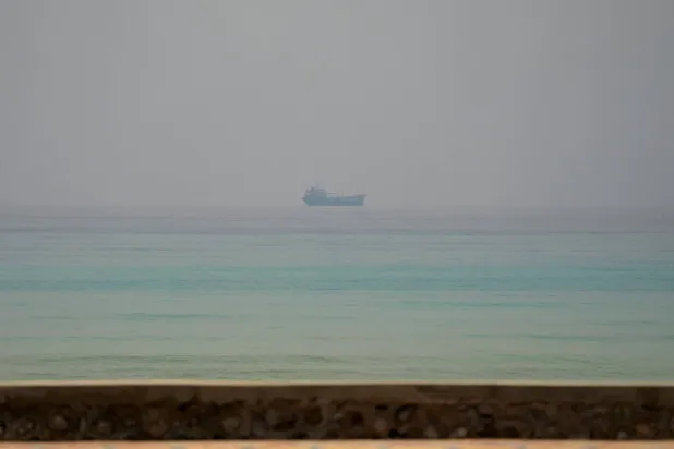  A vessel at the Strait of Hormuz, as seen from Musandam, Oman, July 8, 2026. (Reuters)
