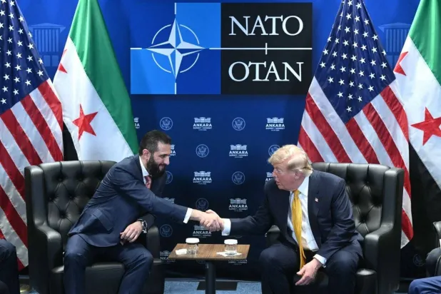US President Donald Trump meets Syrian President Ahmed al-Sharaa (L) on the sidelines of the NATO Summit at Bestepe Presidential Compound in Ankara, on July 8, 2026. (AFP)