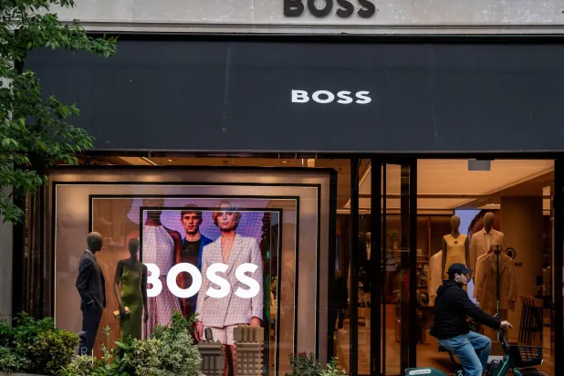FILE PHOTO: A window display is seen at the Boss store in London, Britain, May 30,2024. REUTERS/Chris J. Ratcliffe/File Photo