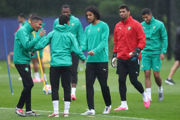 يشير التقرير إلى أن 19 لاعباً من أصل 26 في قائمة المغرب الحالية ولدوا خارج البلاد (أ.ف.ب)
