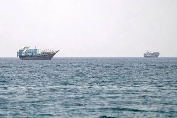 Vessels at the Strait of Hormuz, as seen from Musandam, Oman, July 12, 2026. REUTERS/Stringer 