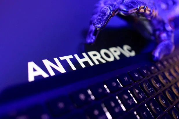 FILE PHOTO: Anthropic logo, a keyboard, and a robotic hand in this illustration taken June 5, 2026. REUTERS/Dado Ruvic/Illustration//File Photo