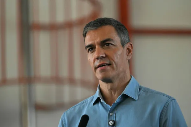 Spain's Prime Minister Pedro Sanchez talks to media during a visit in the area of a wildfire that killed at least 13 people, at the command post set in Turre, Almeria Province, on July 13, 2026. (AFP)