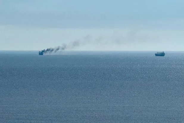 A civilian vessel is on fire, as Ukraine's navy spokesman reported a Russian military strike on a civilian vessel, amid Russia's attack on Ukraine, near the Black Sea port of Odesa, Ukraine, July 14, 2026. (Reuters) 