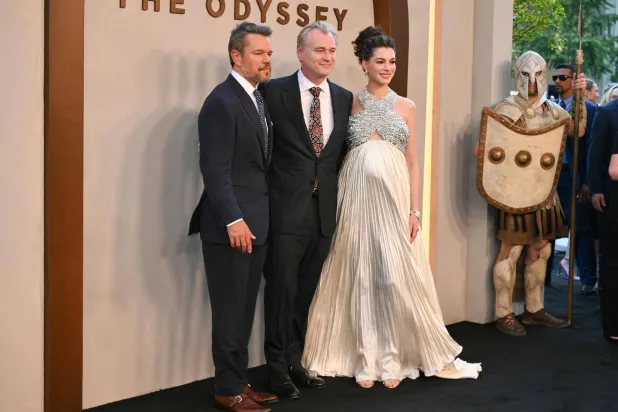  US actor Matt Damon (L), British-US director Christopher Nolan (C) and US actress Anne Hathaway (R) attend "The Odyssey" premiere at the AMC Lincoln Square in New York on July 14, 2026. (AFP) 