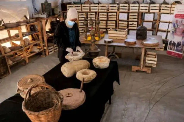 Palestinian curators working to restore ancient artifacts amid the ruins of war-devastated Gaza. (AFP)
