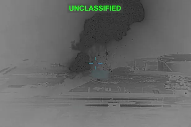 Smoke rises following a strike at an unknown location during what the US military says is its latest wave of strikes on Iran. US Central Command/Handout via REUTERS