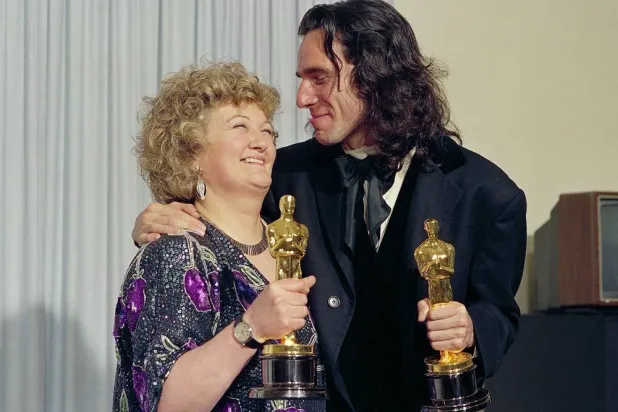 "My Left Foot" stars Brenda Fricker, winner of Oscar for best supporting actress, and Daniel Day Lewis, winner of Oscar for best actor, at the 62nd Annual Academy Awards in Los Angeles, March 26, 1990. (AP) 