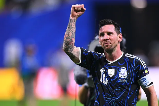 Lionel Messi celebrating qualifying for the World Cup final (DPA)