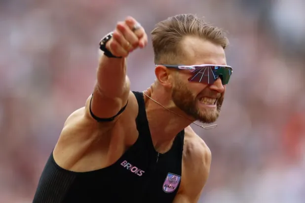 London, Britain - July 18, 2026 Britain's Josh Kerr celebrates after winning the men's 1 mile final and setting a new Meet Record, World Record, and Diamond League Record REUTERS/Matthew Childs 