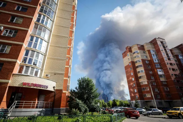 This photograph shows smoke rising from a fire at the Russian e-commerce firm Wildberries' logistics complexes in the town of Elektrostal outside Moscow on July 18, 2026. (Photo by TATYANA MAKEYEVA / AFP)