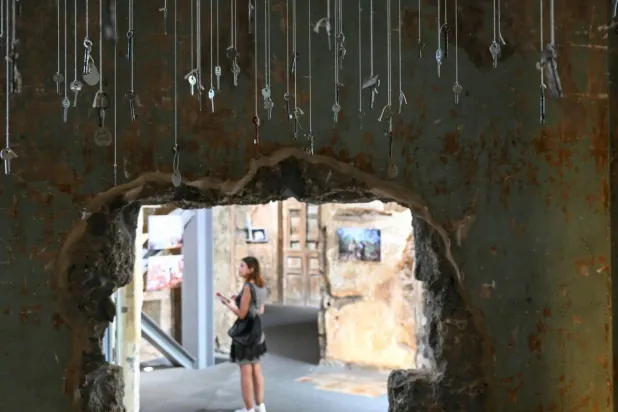 An installation featuring keys from destroyed houses in south Lebanon forms part of an ongoing exhibition at a Beirut museum. JOSEPH EID / AFP
