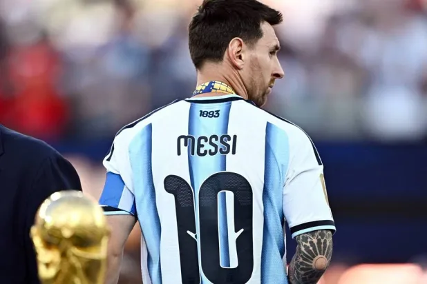 Football - FIFA World Cup 2026 - Final - Spain v Argentina - New York/New Jersey Stadium, East Rutherford, New Jersey, US - July 19, 2026 Argentina's Lionel Messi looks dejected after receiving his runners up medal on the podium after losing the World Cup final. (Reuters)