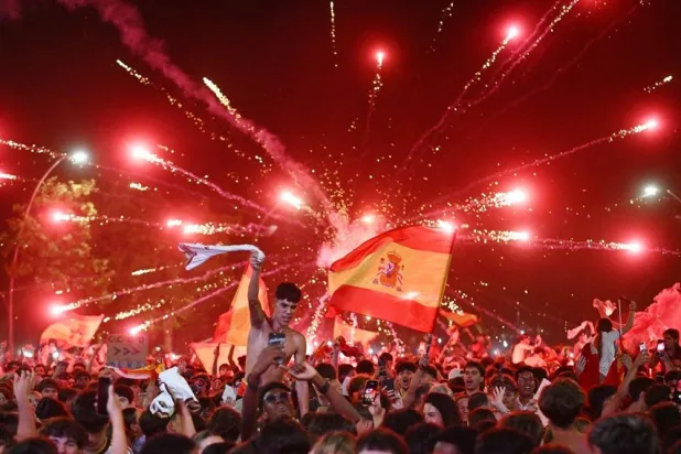 Rocafonda, Spain - July 19, 2026 Spain fans celebrate their first goal as they watch the FIFA World Cup final between Spain and Argentina in Lamine Yamal's hometown. (Reuters)
