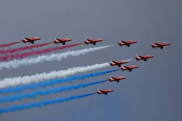 The British Red Arrows display team fly at the Farnborough International Airshow, in Farnborough, Britain, July 22, 2024. (Reuters)