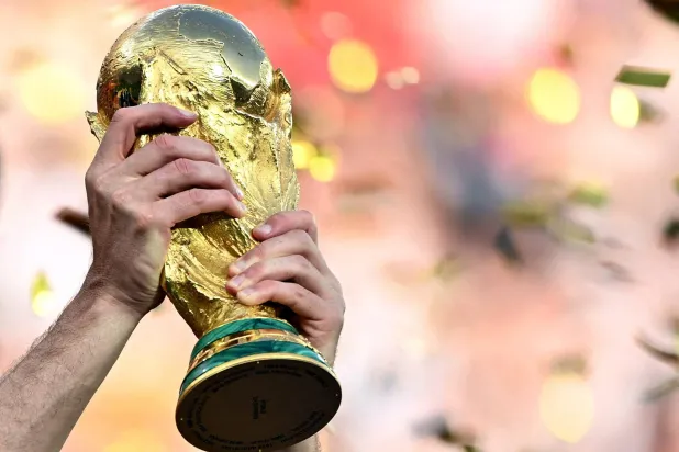 Football - FIFA World Cup 2026 - Final - Spain v Argentina - New York/New Jersey Stadium, East Rutherford, New Jersey, US - July 19, 2026 Spain's Aymeric Laporte lifts the World Cup trophy as he celebrates winning the World Cup. (Reuters)