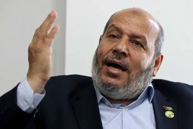 Khalil al-Hayya, senior leader and top Hamas legislative candidate, gestures during an interview with AFP at his office in Gaza City on April 21, 2021. (AFP)