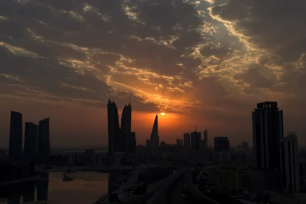  Sun rises during early morning hours in Manama, Bahrain, July 14, 2026. (Reuters)