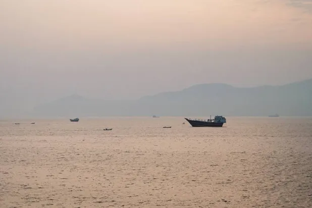 Vessels at the Strait of Hormuz, as seen from Musandam, Oman, July 21, 2026. (Reuters) 