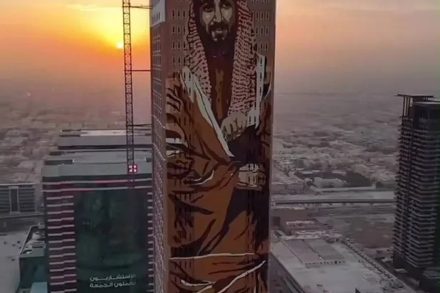  A view of the heritage-inspired Tuwaiq Tower as work on the mural nears completion (Badr Al-Balawi)