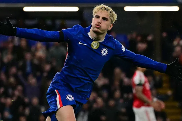 (FILES) Chelsea's Argentinian midfielder #49 Alejandro Garnacho celebrates scoring the team's second goal during the English League Cup semi-final first leg football match between Chelsea and Arsenal at Stamford Bridge, in London on January 14, 2026. (Photo by Ben STANSALL / AFP)