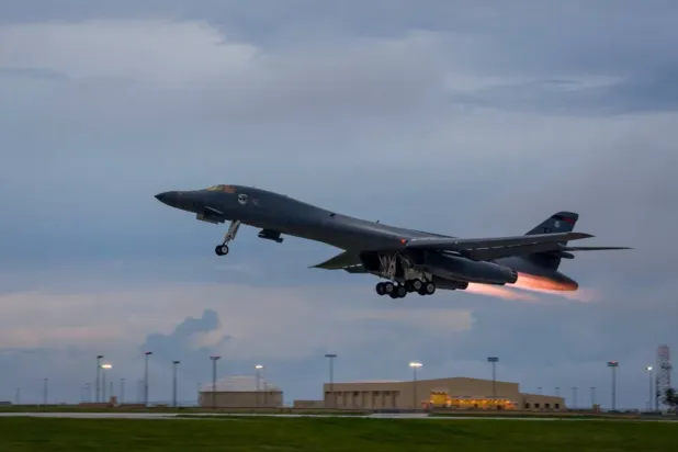 A US Air Force B-1B Lancer assigned to the 37th Expeditionary Bomb Squadron, takes-off to fly a bilateral mission with Japanese and South Korea Air Force jets in the vicinity of the Sea of Japan, from Andersen Air Force Base, Guam, October 10, 2017. (Staff Sgt. Joshua Smoot/US Air Force/Handout via Reuters) 