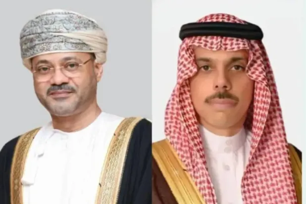 Saudi Foreign Minister Prince Faisal bin Farhan and Omani Foreign Minister Badr Albusaidi. (Asharq Al-Awsat)