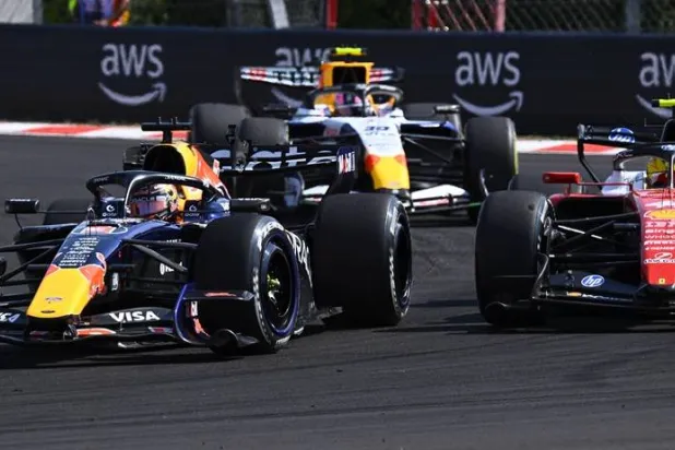 Red Bull driver Max Verstappen of Netherlands, Racing Bulls driver Liam Lawson of New Zealand and Ferrari driver Lewis Hamilton of Britain (L-R)in action during the Formula One Hungarian Grand Prix at the Hungaroring circuit in Mogyorod, Hungary, 26 July 2026. (EPA)