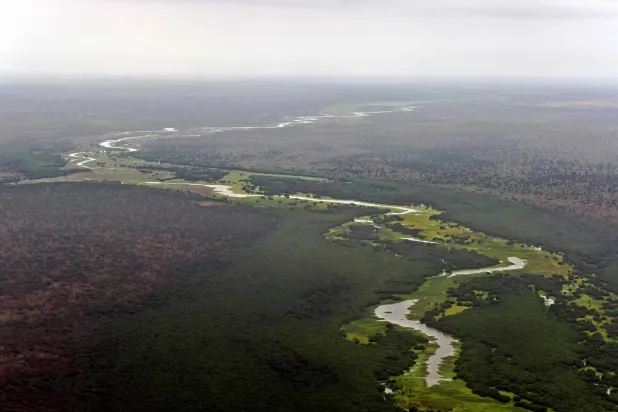 An aerial view of the Pibor river flowing across the landscape between Boma and Badingilo national parks on February 4, 2020. (AFP)