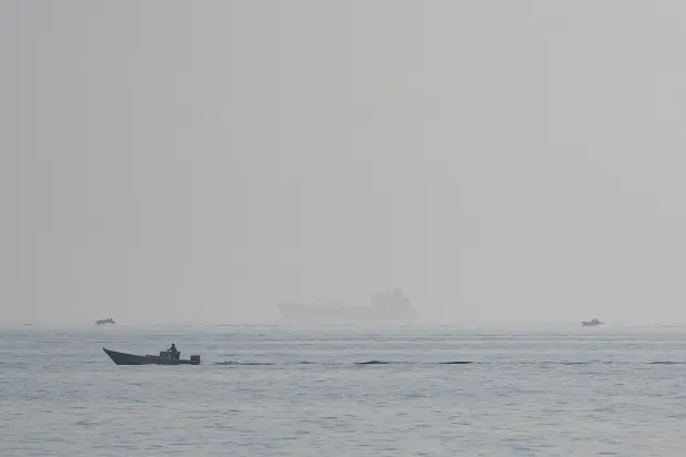 Vessels at the Strait of Hormuz, as seen from Musandam, Oman, July 28, 2026. REUTERS/Stringer