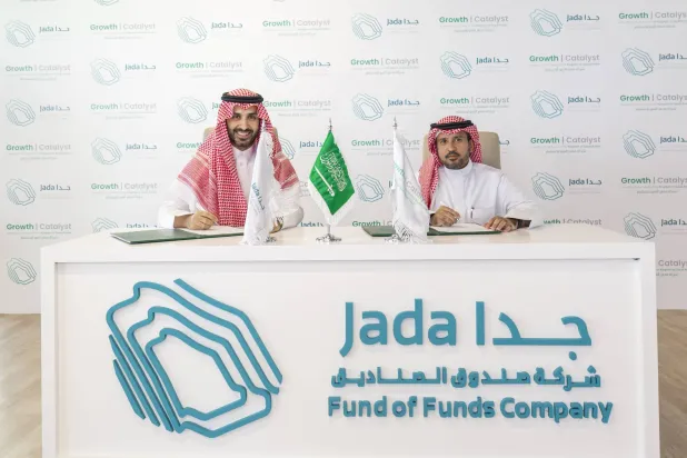 Bandr Alhomaly, CEO and Managing Director of Jada, and Turki Aldayel, Founder and CEO of Growth Catalyst, during the signing of the agreement. (Asharq Al-Awsat)