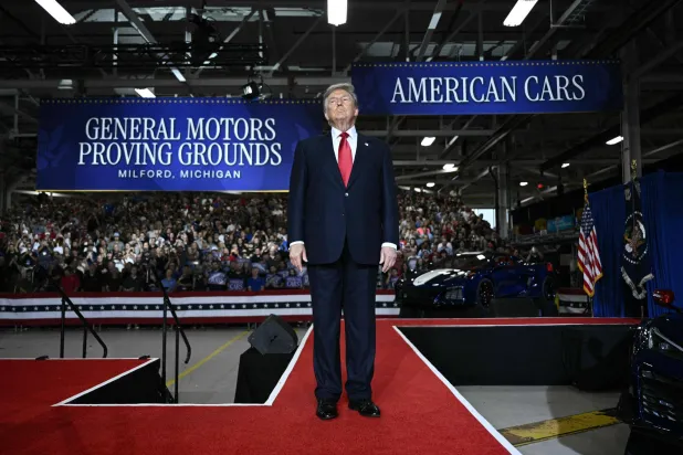 US President Donald Trump arrives before speaking at General Motors’ Milford Proving Ground in Milford, Michigan, on July 27, 2026. (AFP)