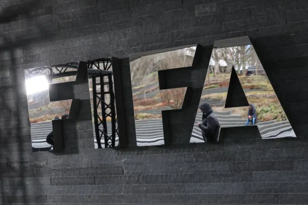13 December 2024, Switzerland, Zurich: FIFA's logo is seen at FIFA headquarters ahead of the draw ceremony for the 2026 World Cup qualifiers in Zurich. (dpa)