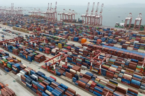 Shipping containers are seen ready for transport at the Guangzhou Port in the Nansha district in southern China's Guangdong province, April 17, 2025. (AP) 