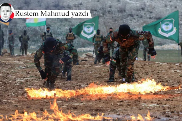 Irak'ın Erbil kentinin yakınlarındaki bir üssünde düzenlenen tatbikata katılan Kürdistan Özgürlük Partisi (PAK) üyesi İranlı Kürtler, 12 Şubat 2026 (Reuters)