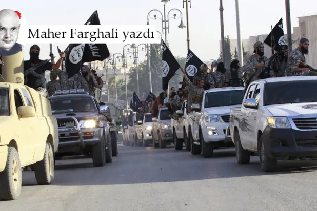 Fotoğraf: Suriye'nin kuzeyindeki Rakka şehrinin sokaklarında askeri araçlarda DEAŞ militanları, 30 Haziran 2014 (Reuters)
