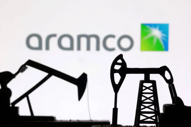 3D-printed oil pump jacks and the Saudi Aramco logo appear in this illustration taken March 2, 2026. (Reuters)