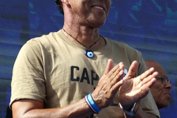 Soccer Football - FIFA World Cup 2026 - Cape Verde arrive home in Praia - Praia, Cape Verde - July 5, 2026 Cape Verde coach Bubista celebrates with players and fans after arriving from the United States REUTERS/Sodiq Adelakun