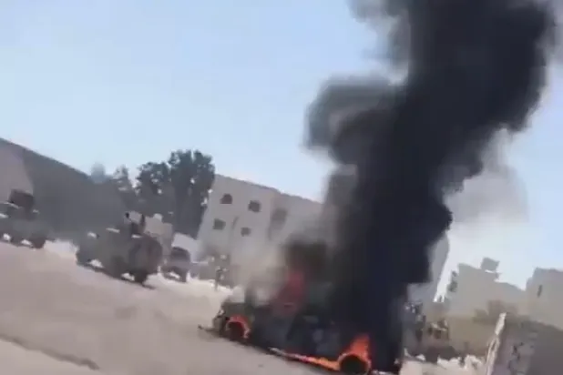 جانب من اشتباكات صرمان (من فيديو متداول نشرته وسائل إعلام محلية)