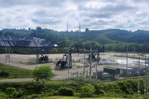 FILE PHOTO: Oil pumpjacks are pictured in an Ecopetrol oil field in Barrancabermeja, Colombia October 11, 2024. REUTERS/Nelson Bocanegra/File Photo