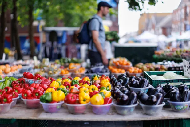 People shop for fruits and vegetables at a street market in East London, Britain, 05 August 2026. EPA/TOLGA AKMEN