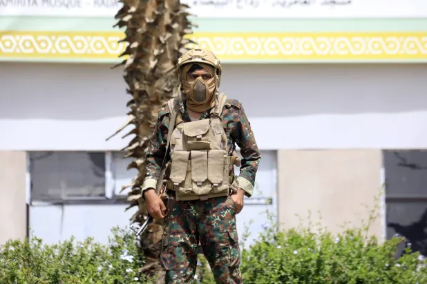 A Houthi militiaman stands guard in the proximity of Sanaa airport, in Sanaa, Yemen, 05 August 2026. EPA/YAHYA ARHAB