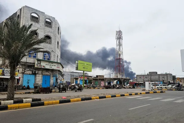  Smoke rises during Houthi missile and drone strikes on the Red Sea port city of Mokha, Yemen, August 9, 2026. (Reuters)