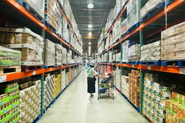 A woman shops for food items from a wholesale retailer in Alhambra, California on August 11, 2026. (AFP)