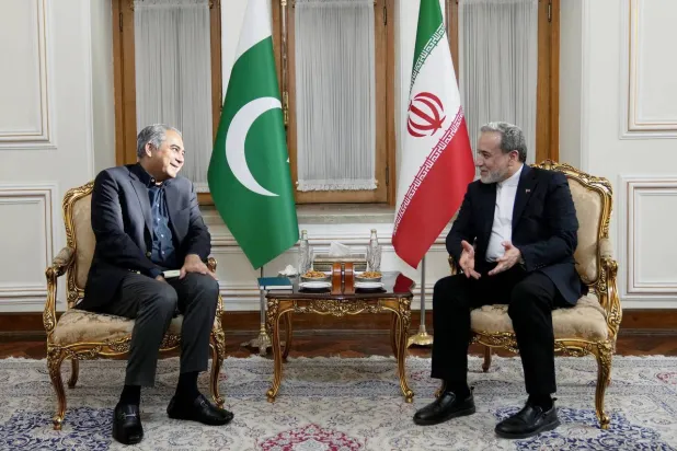 A handout photo made available by the Iranian Foreign Ministry Office shows Iranian Foreign Minister Abbas Araghchi (R) meeting with Pakistan's Minister of Interior Mohsin Naqvi in Tehran on August 11, 2026. (Iran Foreign Ministry / AFP) 